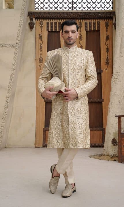 Off white embroidered sherwani for groom with hidden buttons