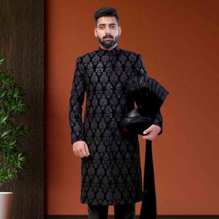 Black velvet sherwani for groom with subtle embroidery
