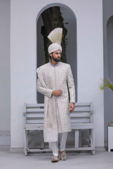 Light grey premium sherwani for groom with subtle embroidery