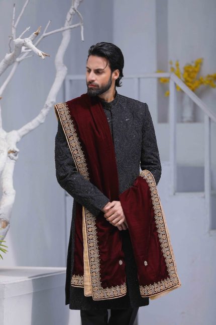 Black sherwani with royal embroidered shawl for groom