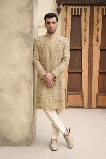 Golden jamawar sherwani for groom with heavy embroidery