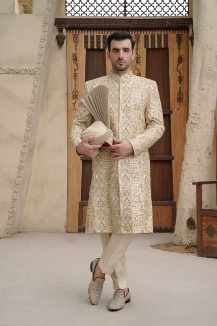 Off white embroidered sherwani for groom with hidden buttons