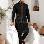 Elevate your traditional wardrobe with this luxurious black embroidered waistcoat set, designed for men who appreciate timeless eastern fashion with a modern touch.