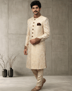 Elevate your wedding and festive look with this Luxury IvoryJamawar Sherwani, crafted from premium Jamawar fabric featuring an elegant woven pattern.