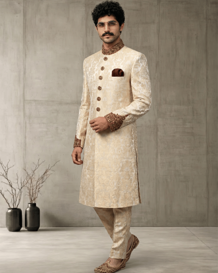 Elevate your wedding and festive look with this Luxury IvoryJamawar Sherwani, crafted from premium Jamawar fabric featuring an elegant woven pattern.
