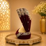 Make your wedding day unforgettable with this Luxury Maroon Velvet Groom Turban, crafted for grooms who appreciate elegance and tradition.