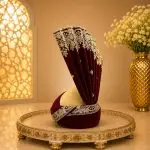 Make your wedding day unforgettable with this Luxury Maroon Velvet Groom Turban, crafted for grooms who appreciate elegance and tradition.