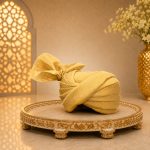 Add a touch of royal elegance to your special day with our Luxury Golden Royal Turban, crafted for the modern groom who desires a majestic and sophisticated look.