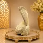 Elevate your wedding look with our Royal Ivory Groom Turban, designed for a sophisticated and majestic appearance. Crafted with premium fabric and detailed embroidery work