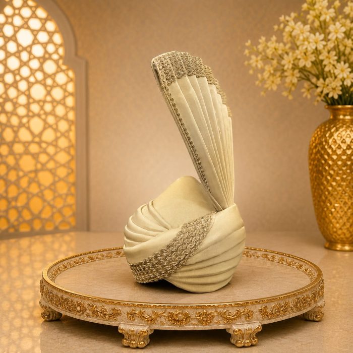 Elevate your wedding look with our Royal Ivory Groom Turban, designed for a sophisticated and majestic appearance. Crafted with premium fabric and detailed embroidery work