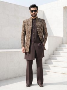 Home 1 Make a lasting impression with our Luxury Brown Jacquard Short Sherwani Three Piece Suit. Featuring an intricately woven jacquard short sherwani