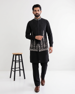 Home 7 Elevate your traditional look with this premium Black Jamawar Waistcoat, expertly crafted from high-quality Jamawar fabric.