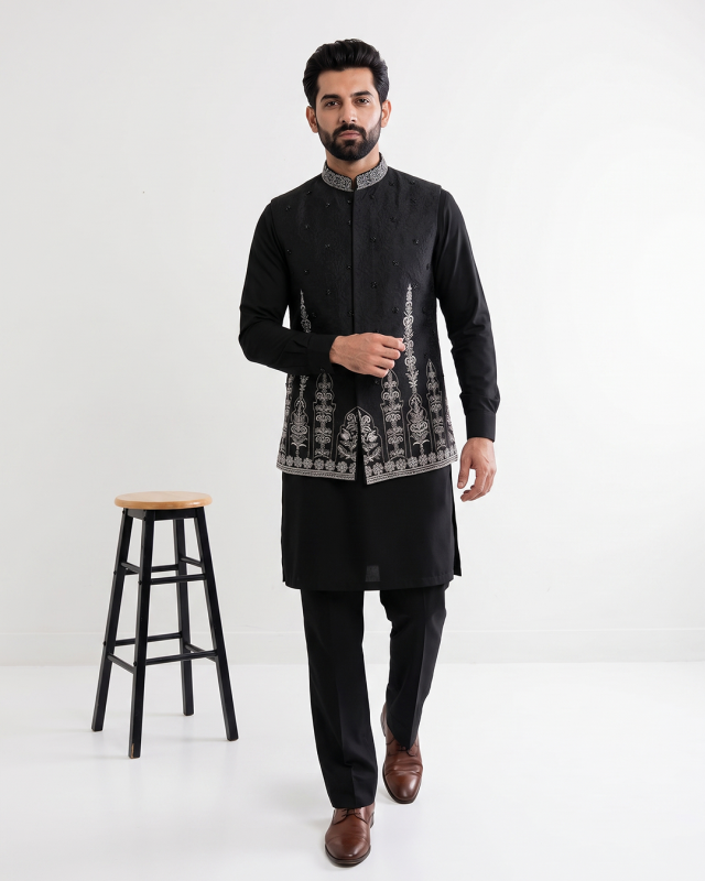 Elevate your traditional look with this premium Black Jamawar Waistcoat, expertly crafted from high-quality Jamawar fabric.
