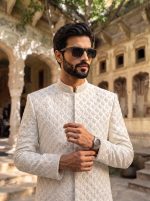 Off-white handmade embroidered groom sherwani with floral detailing and band collar.