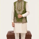 Boys embroidered waistcoat in olive green raw silk with elegant single-hand machine embroidery.