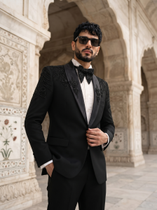 Black handmade embroidered designer tuxedo suit for men with luxury detailing and elegant formal wedding style.
