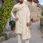 Luxury ivory embroidered kurta pajama for men with matching shawl, ideal for weddings, Eid and formal occasions.