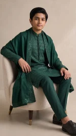 Boys dark green embroidered kurta pajama in premium raw silk, custom-made traditional wear for weddings and Eid.